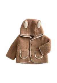 Giacca in pile marrone con cappuccio e orecchie da orso. Presenta un bordo bianco, due tasche frontali e chiusure a bottone. Materiale morbido e testurizzato.