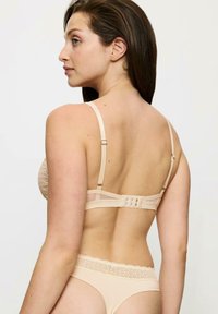 Triumph AURA SPOTLIGHT  beżowy