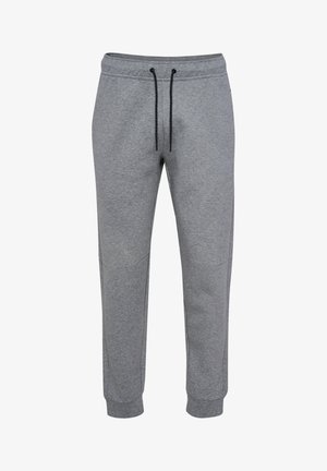 Grå sweatpants lavet af blødt stof, med en snoretræksliv, sidelommer og en tapered ben-design, samt ribbede manchetter ved anklerne.