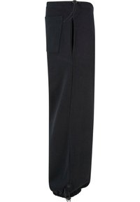 Sorte sweatpants med snor i taljen, sidelomme, tætsiddende cuffs og glat tekstur. Enkel design og moderne silhuet.