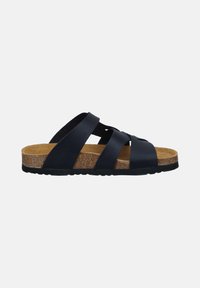 Black slide sandal with three wide straps, cork midsole, and textured rubber outsole. Features a flat design and open toe.