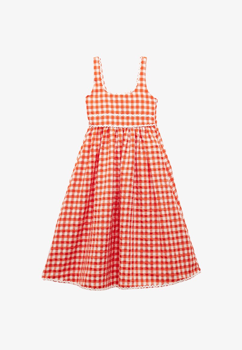 Gingham-mekko, jossa on oranssi ja valkoinen ruutukuosi, neliön muotoinen kaula-aukko ja säädettävät olkaimet. Laikukas helma ja koristeellinen aaltojataitti.
