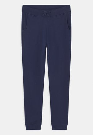 Pantalon de survêtement bleu marine en tissu doux, doté d'une taille élastique avec cordon de serrage, de poches latérales et de chevilles fuselées.