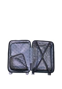 Black hard-shell suitcase with a lined interior. Features cross straps and a zippered compartment. Smooth-rolling wheels for easy transport.