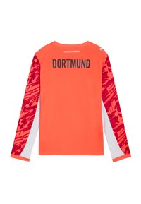 Oranssi pitkähihaiset urheilupaita, jossa on punaiset kuviolliset hihat. Takana mustalla painettuna "DORTMUND". Sileä tekstuuri, pyöreä kaula-aukko.