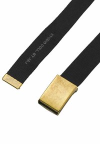 Black woven fabric strap with a metallic gold buckle. The strap features a textured finish and flat ends for securing.