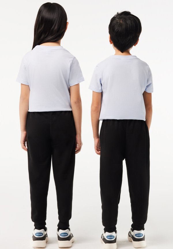 UNISEX - Tracksuit bottoms - noir4