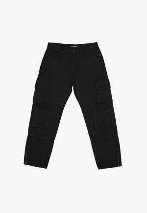 Black cargo pants made of durable fabric, featuring multiple cargo pockets, zippered ankles, and straight legs with subtle stitching details.