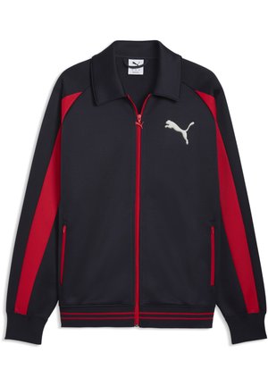 Giacca Puma nera e rossa con zip rossa, pannelli laterali rossi, tasche frontali e logo Puma bianco sul petto.