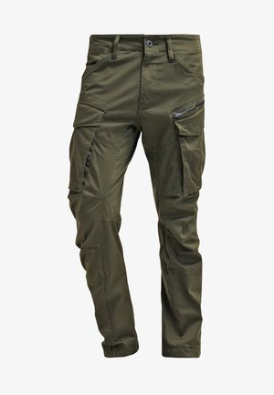 Calças cargo de verde oliva feitas de algodão resistente. Apresenta múltiplos bolsos, um bolso lateral com fecho de correr e pernas afuniladas com um acabamento ligeiramente texturizado.