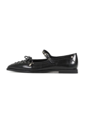 Black leather flat shoe with a pointed toe, featuring a lace-up front and side strap with metallic accents. Smooth, glossy texture.