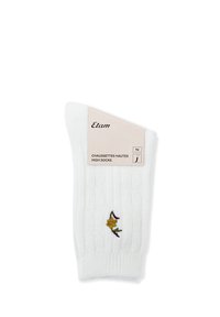 Calza alta bianca con texture a coste, caratterizzata da un piccolo ricamo floreale e un'etichetta con la scritta "Etam" in un font minimalista.