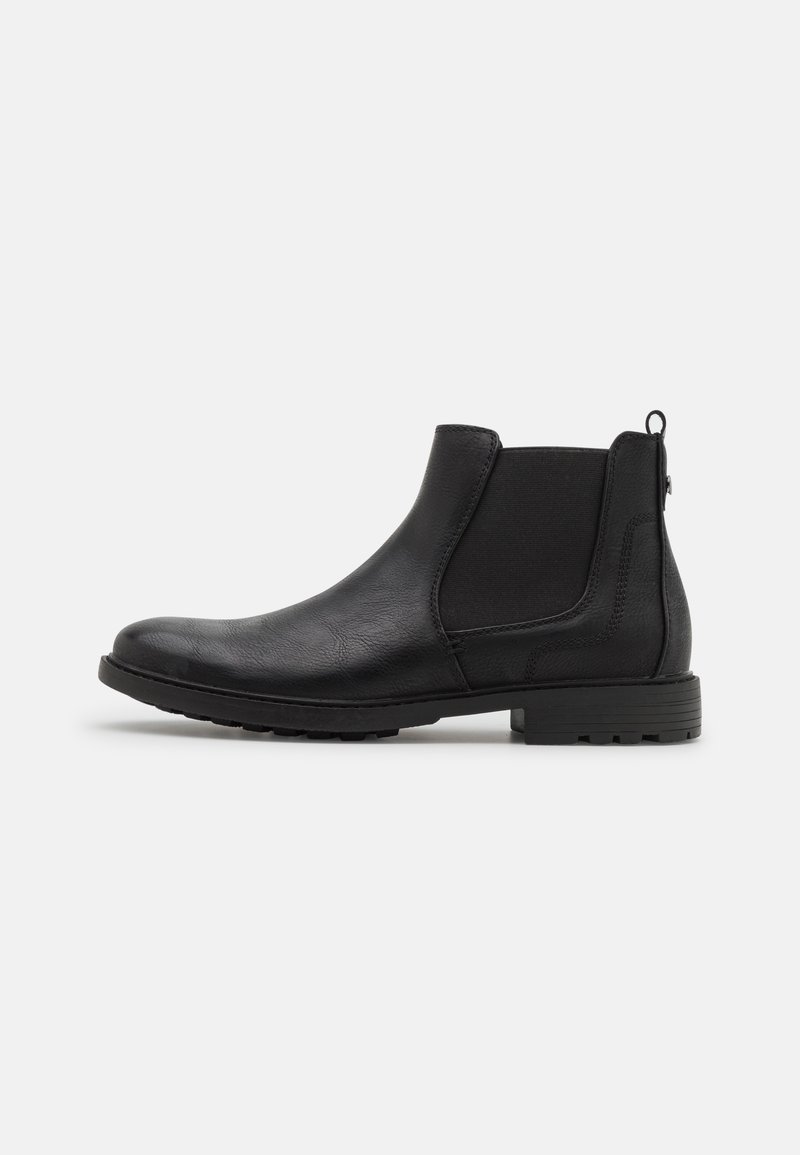 Bottes cheville en cuir noir avec panneaux latéraux élastiques et languette. Présentent une finition texturée et une semelle en caoutchouc pour une meilleure adhérence.