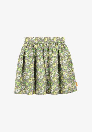 Jupe fleurie avec une ceinture froncée, présentant un motif vert, jaune et violet. Patch ours notable sur l'ourlet. Matière coton.