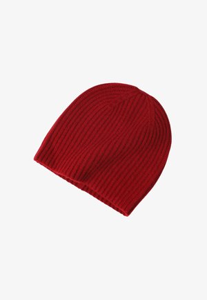 Berretto di lana rossa a maglia con texture a coste, design leggermente scivoloso e parte superiore arrotondata, ideale per il calore e per un look casual.
