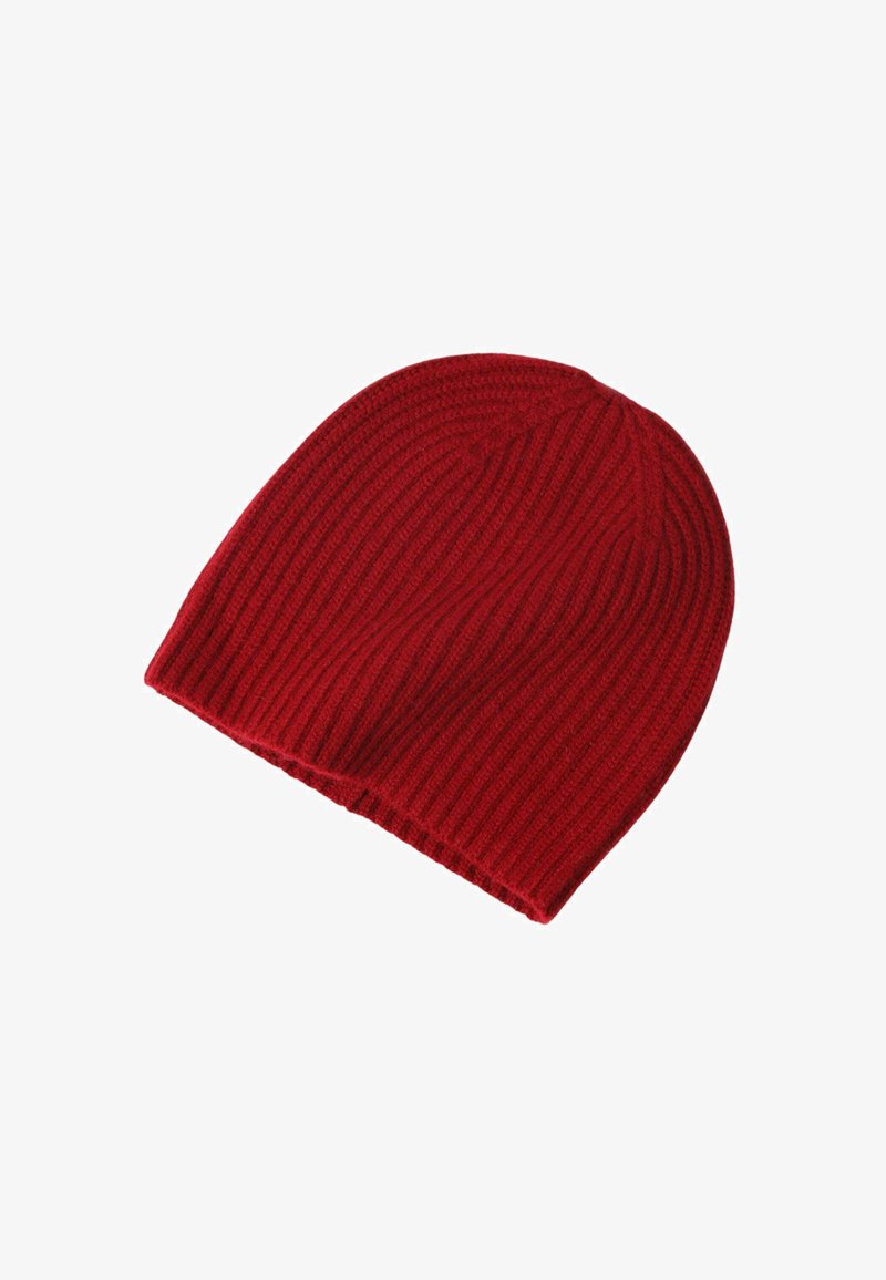 Berretto di lana rossa a maglia con texture a coste, design leggermente scivoloso e parte superiore arrotondata, ideale per il calore e per un look casual.