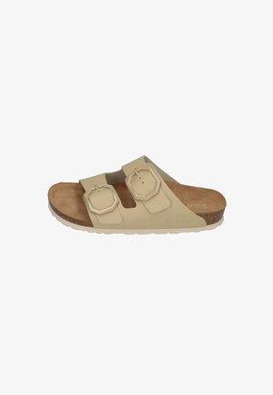 Light beige slide sandal with two adjustable octagonal straps, cork footbed, and textured rubber outsole. Flat design for comfort.