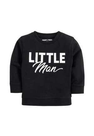 Sweatshirt noir à manches longues pour tout-petit avec texte blanc "LITTLE Man" imprimé sur le devant en caractères gras et en écriture cursive.