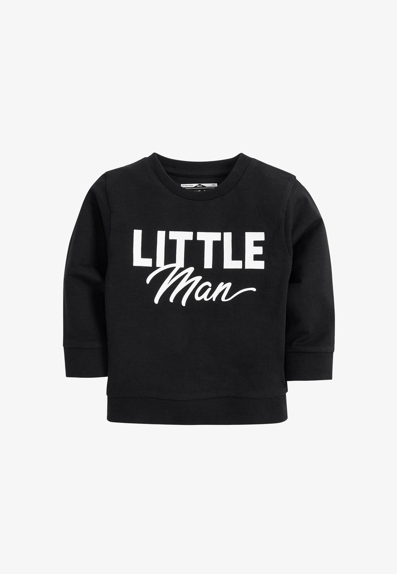 Sweatshirt noir à manches longues pour tout-petit avec texte blanc "LITTLE Man" imprimé sur le devant en caractères gras et en écriture cursive.