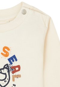 Baumwollhemd mit langen Ärmeln in Off-White und Rundhalsausschnitt. Verfügt über Druckknopfdetails und einen grafischen Druck mit einem Seehunddesign in mehrfarbigem Text.