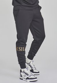 DYNAMIC JOGGERS - Tréningruha alsók - black