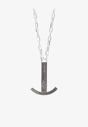 Silver metal necklace featuring a horizontal bar pendant with a curved bottom. Chain link design with a polished texture and engraved detail.