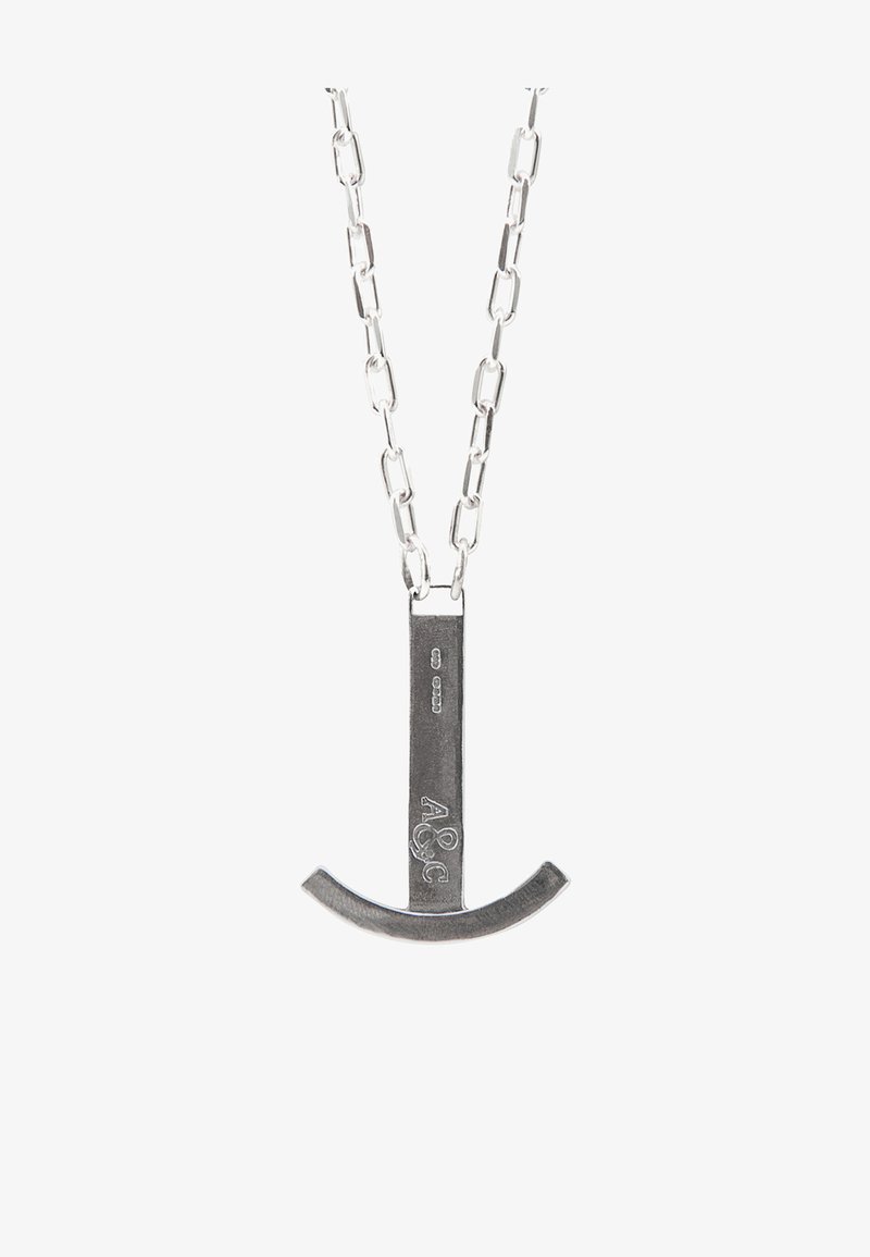 Silver metal necklace featuring a horizontal bar pendant with a curved bottom. Chain link design with a polished texture and engraved detail.