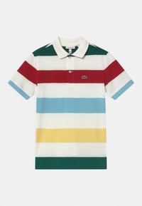 Koszulka polo w poziome paski w kolorach czerwonym, zielonym, jasnoniebieskim, białym, żółtym, z logo Lacoste. Posiada kołnierzyk i zapięcie na dwa guziki.