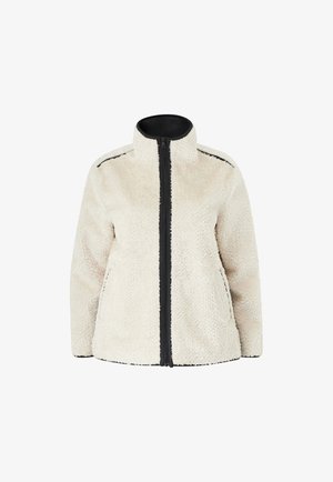 Cremefarvet fleecejakke med lynlås foran, høj krave og sorte detaljer langs skuldrene og lynlåsen. Blødt, struktureret materiale.