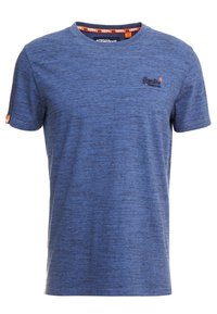 Niebieski melanżowy t-shirt z bawełny z krótkimi rękawami, okrągłym dekoltem i małym logo na piersi. Posiada kontrastową taśmę wewnętrzną przy dekolcie.