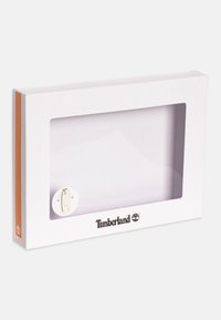 Scatola di imballaggio bianca con una finestra frontale trasparente. Presenta un logo stampato e una piccola grafica di un body per bambini. Dettagli in colore arancione.