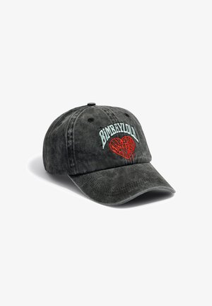 Black denim baseball cap with curved brim, embroidered "BIMBA Y LOLA" and red heart logo, six-panel design with adjustable strap.