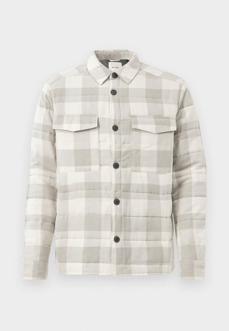 Hellgrau-weiße karierte gestepptes Hemdjacke mit Kragen, vorderer Knopfleiste und zwei Brusttaschen mit Klappe.