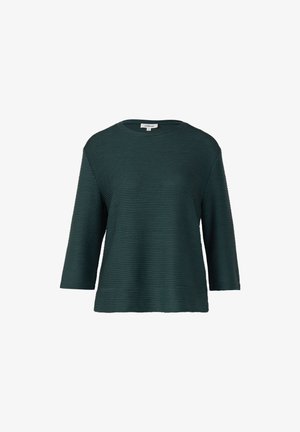 Tamnozelena, teksturirana majica s horizontalnim rebrastim uzorkom, okruglim izrezom i rukavima do tri četvrtine. Opušteni kroj, bez vidljive metalne opreme.