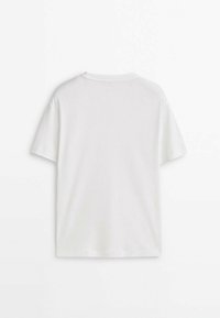 T-shirt blanc uni à manches courtes présenté de dos sur fond blanc avec un col rond.