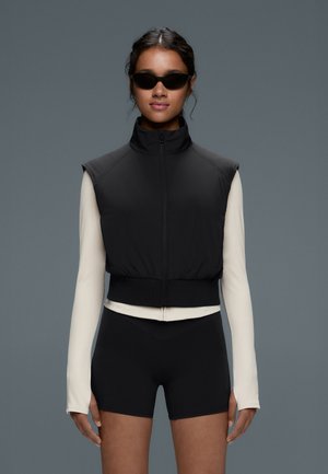 OYSHO, FELLEX® VOLCANIC PADDED TECHNICAL GILET - Veste sans manches - black