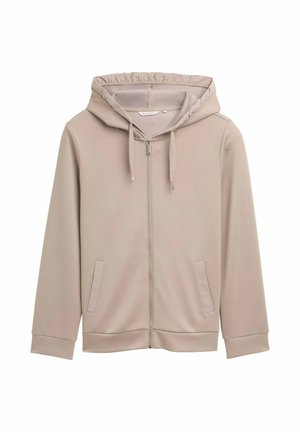 Sweat-shirt beige zippé avec capuche à cordon et deux poches fendues à l'avant, présenté sur un fond blanc.