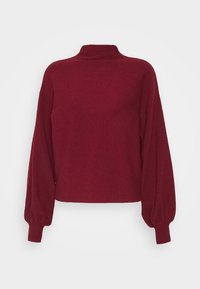 Burgundy pullovertröja med hög hals, långa ballongsärmar och avslappnad passform. Tillverkad av mjukt tyg med en texturerad yta.