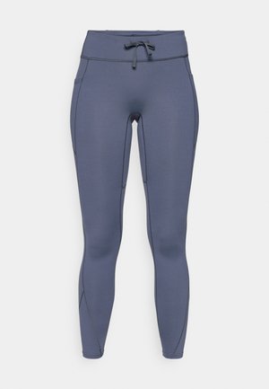 Hoge taille leggings in een donker leisteenblauwe kleur, gemaakt van rekbaar materiaal. Voorzien van een trekkoord, zijzakken en contraststiksels.