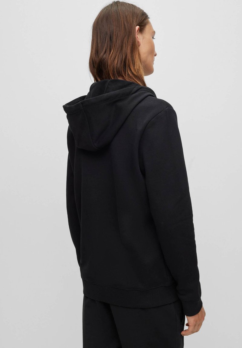 HUGO - Sweat à capuche zippé en molleton de coton avec motif artistique de la saison - Noir