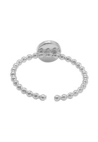 Portachiavi in metallo argento a forma circolare, con un design a perline e un punto di attacco liscio e rotondo.