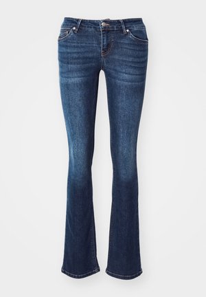 Mörkblå utsvängda jeans gjorda av denim. Har fem fickor, en dragkedja med knappstängning och subtil blekning på framsidan av låren.