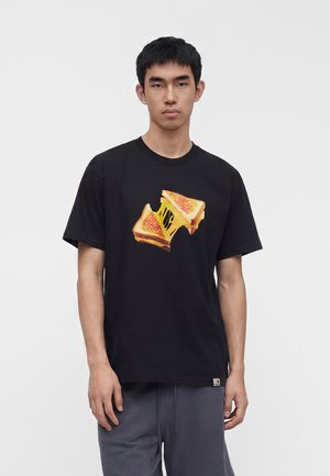 Carhartt WIP, CHEESE TOAST - Μπλουζάκι με στάμπα - black