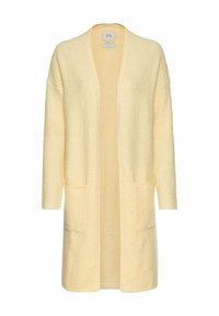 Cardigan long et doux jaune à ouverture devant avec deux poches avant et une texture en tricot côtelé.