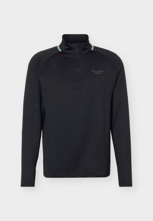 Μαύρο αθλητικό τοπ με μακριά μανίκια, φερμουάρ μέχρι το ένα τέταρτο, ψηλό γιακά, τυρκουάζ ριγέ λεπτομέρειες στους ώμους και μικρό λογότυπο "Ted Baker Sport" στο στήθος.