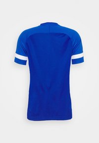 Blue athletic jersey featuring a crew neck, short sleeves, and white stripes on the sleeves. Made from breathable, textured fabric.