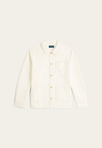 Witte katoenen jas met een puntkraag, vier voorzakken en gouden knopen. Glad oppervlak en recht gesneden ontwerp.