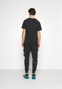 Nike Sportswear Trainingsbroek - black