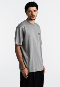 Carhartt WIP Camiseta estampada - misty grey