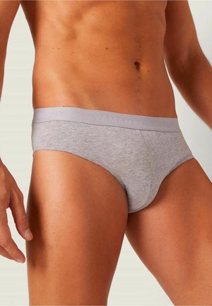 Graue Baumwollslips mit einem weichen elastischen Bund, die eine glatte Textur und eine enge Passform an Hüften und Oberschenkeln bieten.